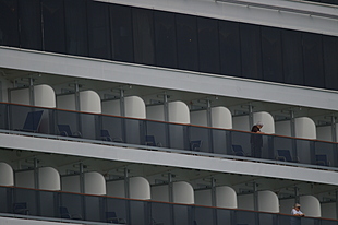 Opvarenden op hun balkon